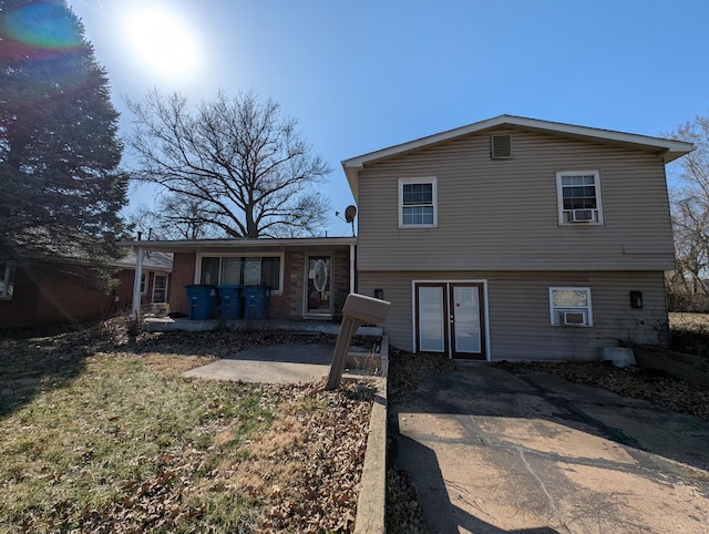 back of house with a patio area