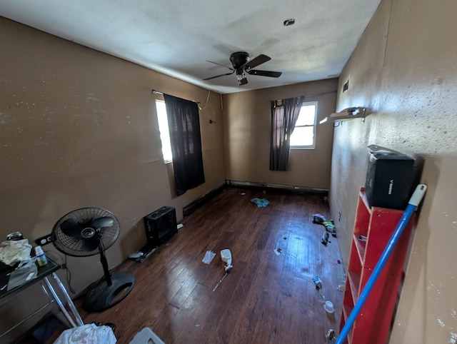 unfurnished bedroom featuring a ceiling fan and wood finished floors