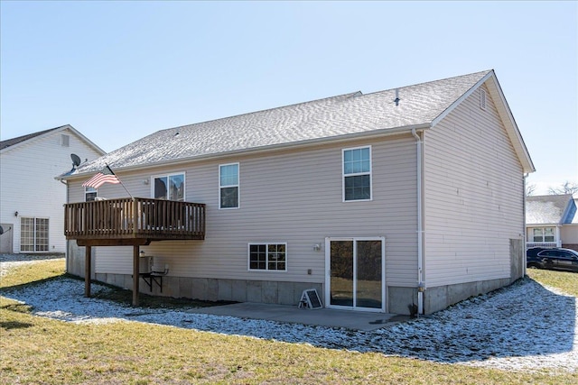 back of house with a patio and a yard