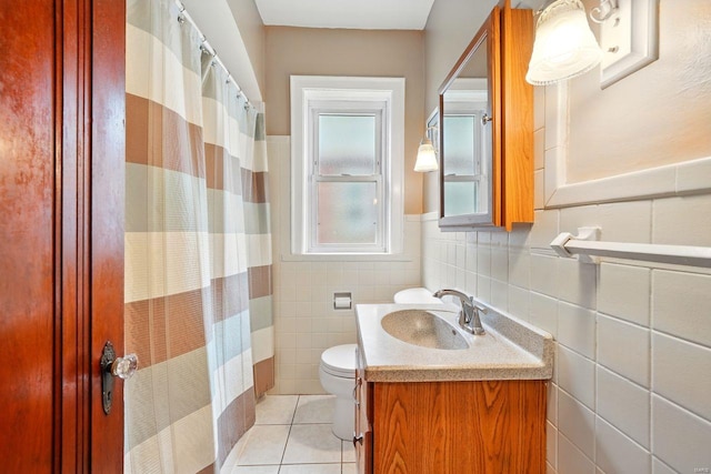bathroom featuring tile walls, vanity, tile patterned floors, toilet, and a shower with shower curtain