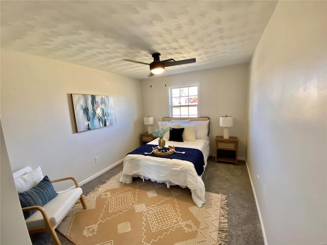 carpeted bedroom featuring a ceiling fan and baseboards