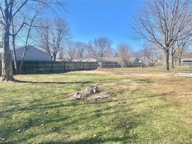 view of yard with fence