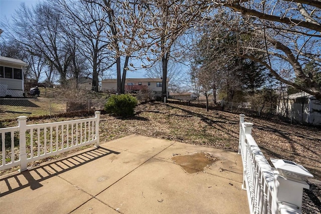 view of yard with a patio and fence