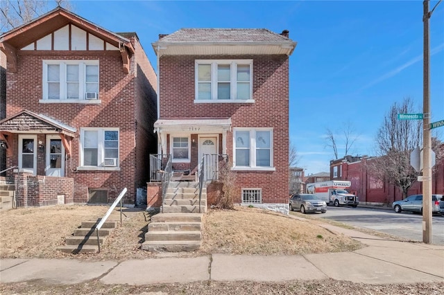 view of front of home with brick siding