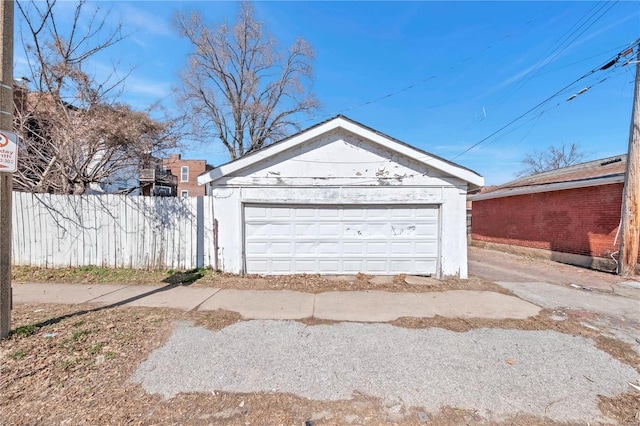 detached garage with fence