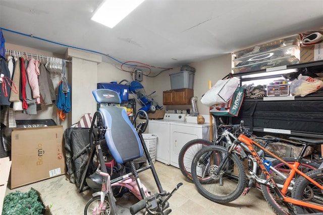 storage area featuring washer and dryer