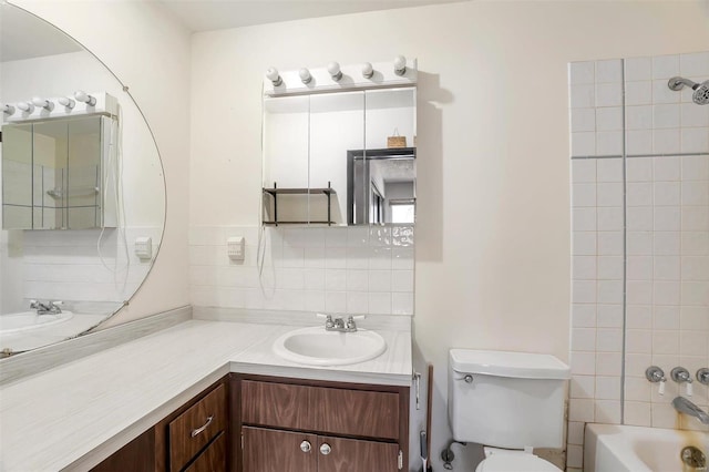 full bathroom featuring tasteful backsplash, shower / tub combination, vanity, and toilet