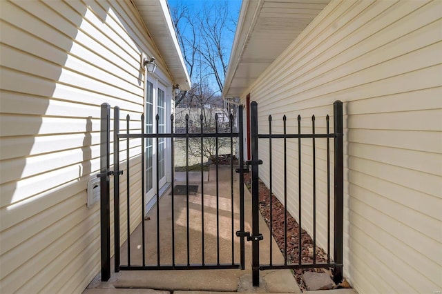 view of gate featuring fence