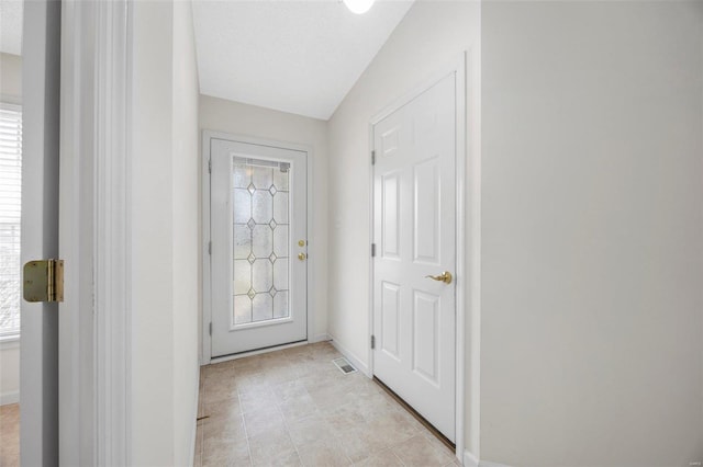 entryway featuring visible vents and baseboards