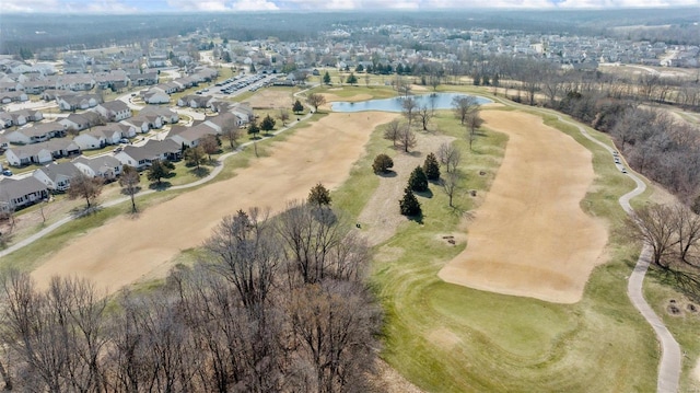 birds eye view of property featuring a water view and a residential view