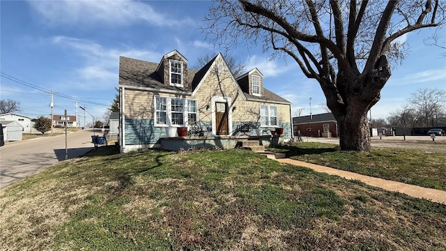 view of front of home with a front yard