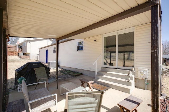 view of patio / terrace with an outdoor living space, central air condition unit, and entry steps