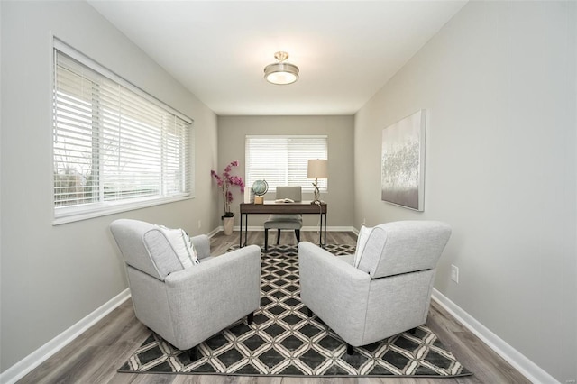 office space featuring wood finished floors and baseboards