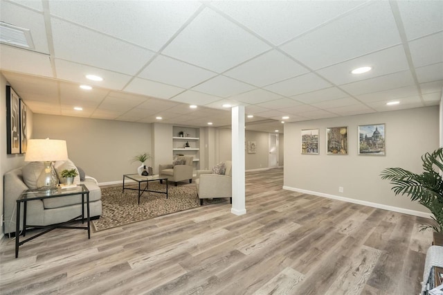 interior space featuring visible vents, recessed lighting, baseboards, and wood finished floors