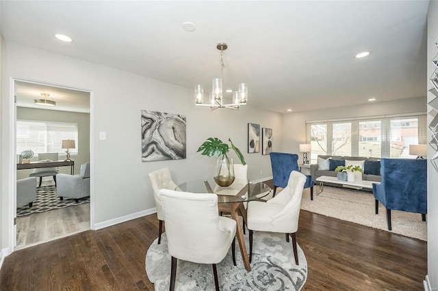 dining space featuring recessed lighting, a chandelier, baseboards, and wood finished floors