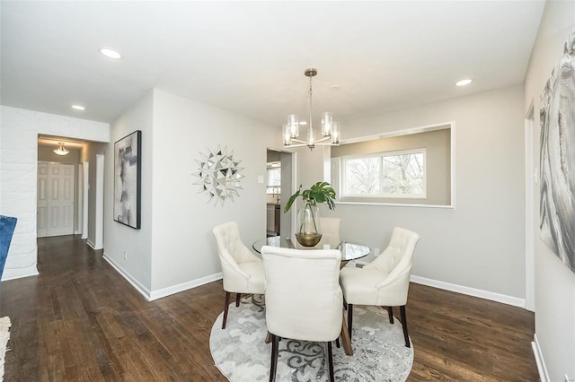 dining space with recessed lighting, wood finished floors, and baseboards