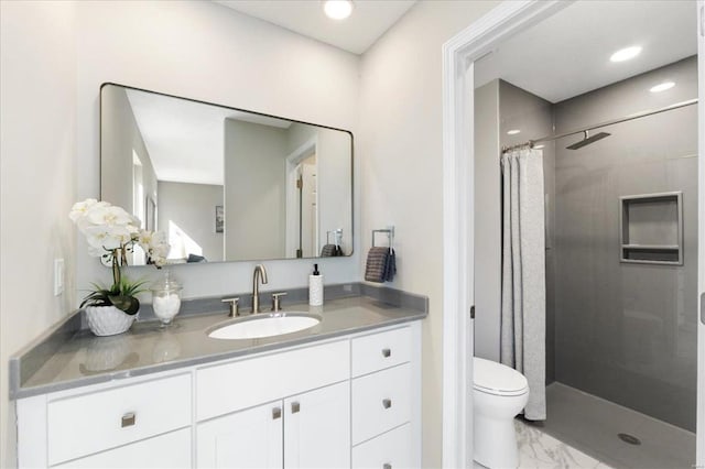 bathroom featuring vanity, recessed lighting, a shower stall, toilet, and marble finish floor