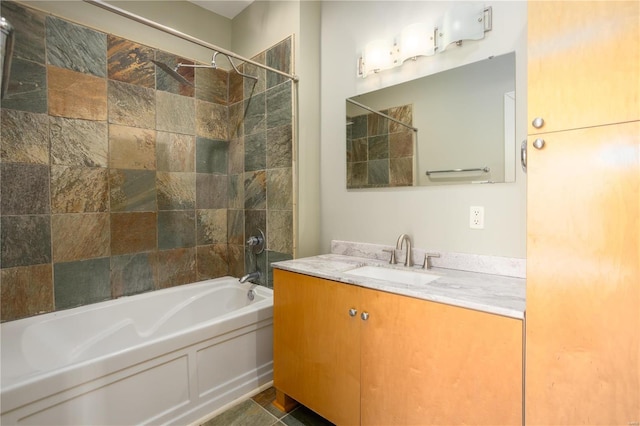 full bathroom featuring tub / shower combination and vanity