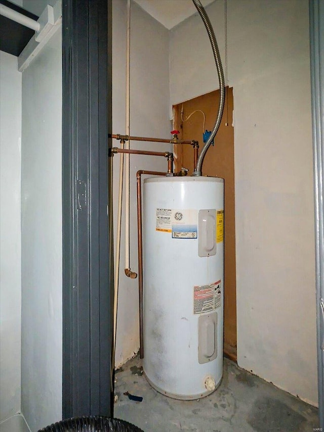 utility room with water heater