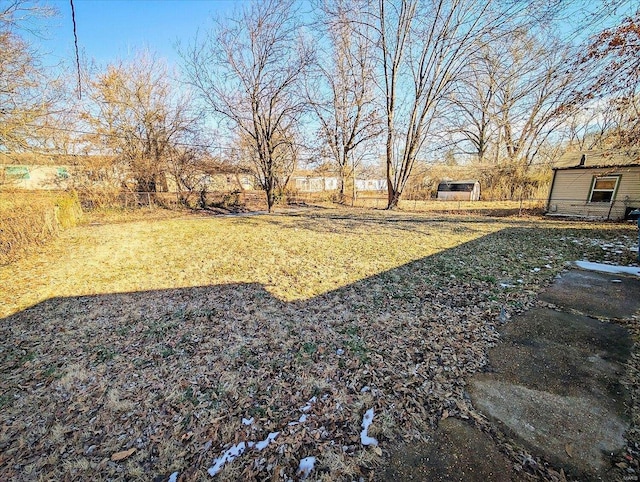 view of yard with fence