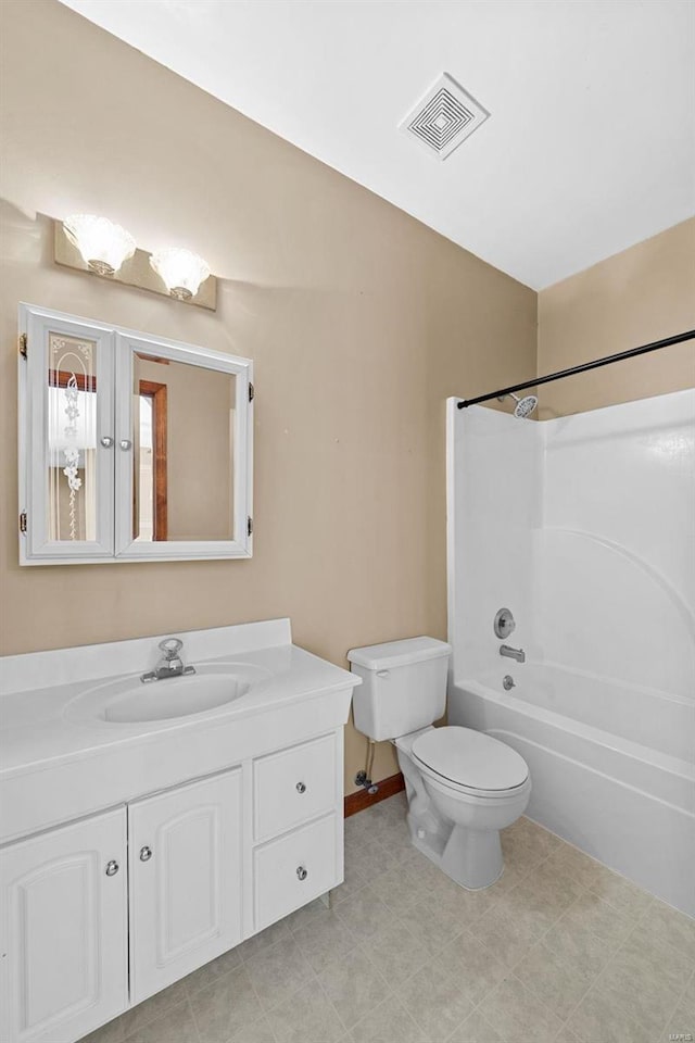 full bathroom with visible vents, toilet, shower / washtub combination, baseboards, and vanity