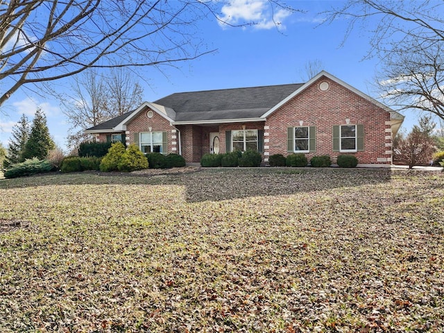 view of front of home with brick siding