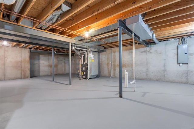 unfinished basement with electric panel and heating unit