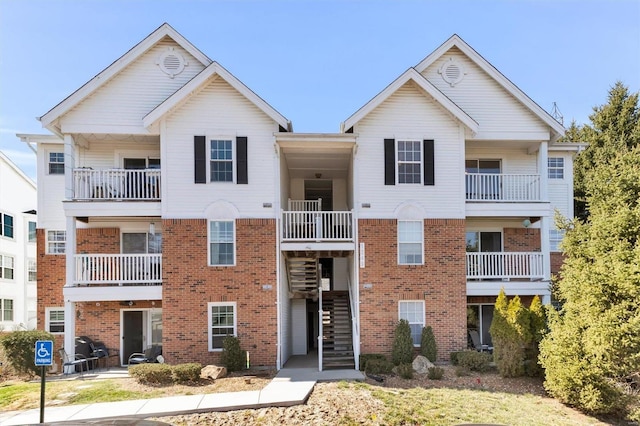 view of property featuring stairs