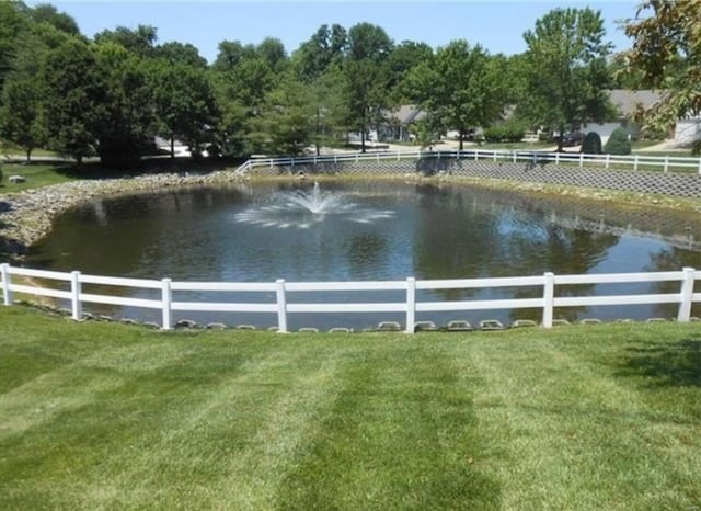 view of water feature featuring fence