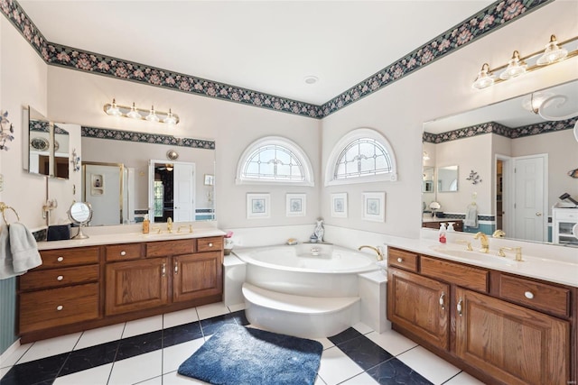 full bath with a sink, a garden tub, a shower stall, and tile patterned flooring