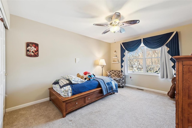 bedroom with baseboards, carpet floors, and visible vents