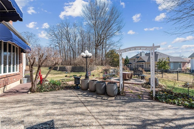 view of patio / terrace with fence