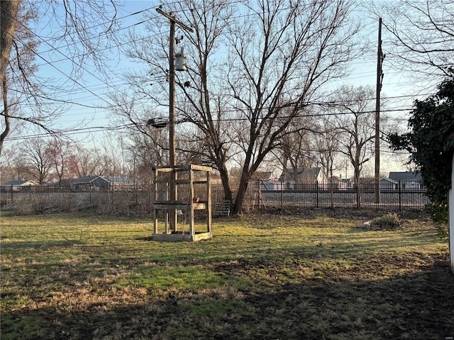 view of yard featuring a vegetable garden and a fenced backyard