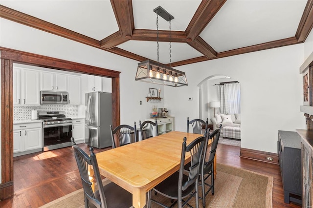 dining room with crown molding, dark wood-type flooring, baseboards, beamed ceiling, and arched walkways