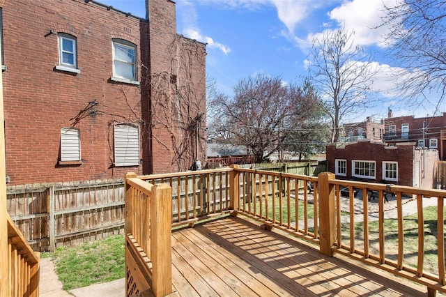 wooden deck featuring fence