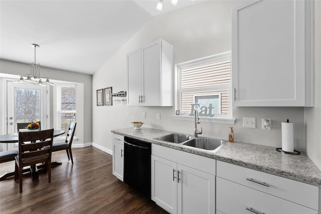 kitchen featuring a sink, lofted ceiling, dishwasher, and a healthy amount of sunlight