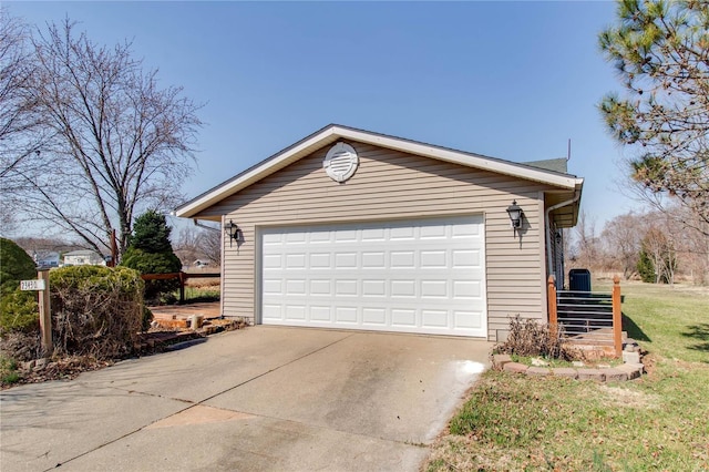 detached garage featuring central air condition unit