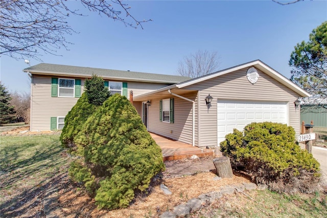 view of front of property featuring a garage