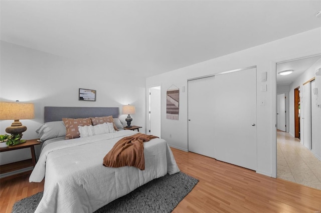 bedroom featuring light wood-type flooring