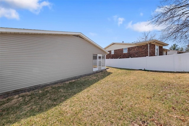 view of yard with fence