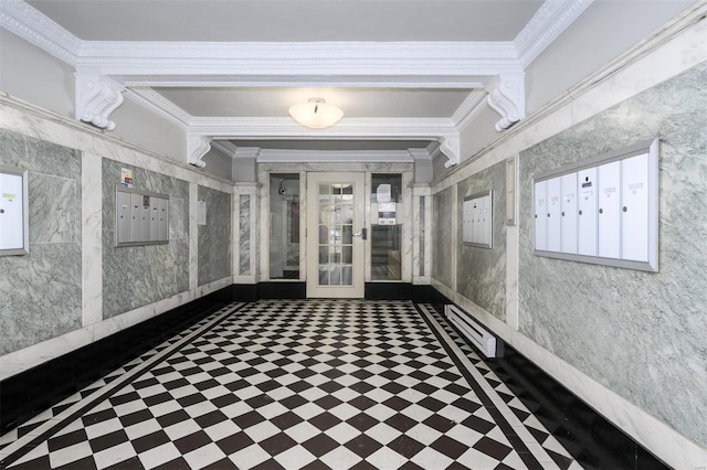 interior space featuring mail area and ornamental molding