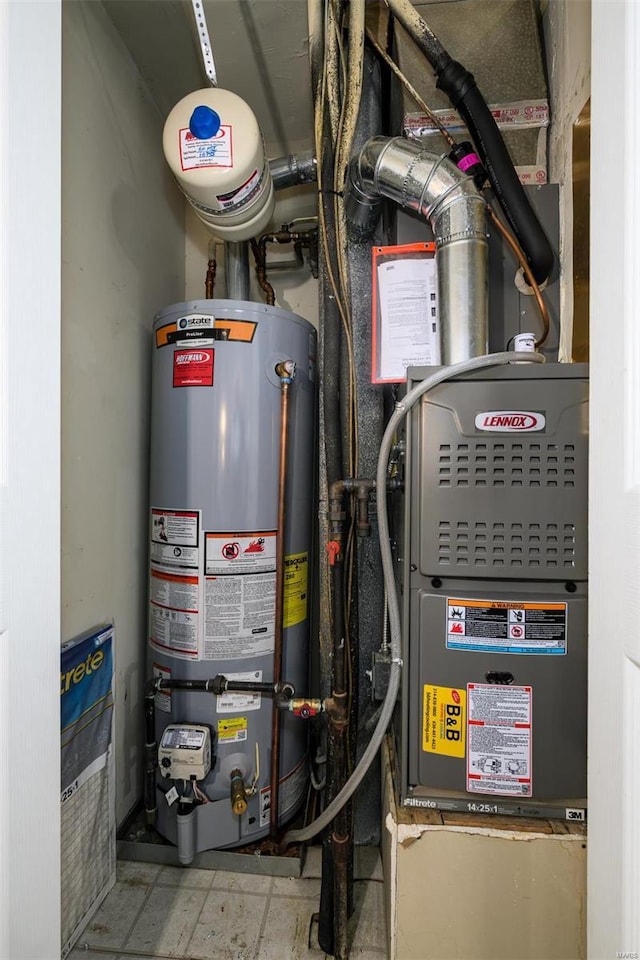 utility room featuring gas water heater