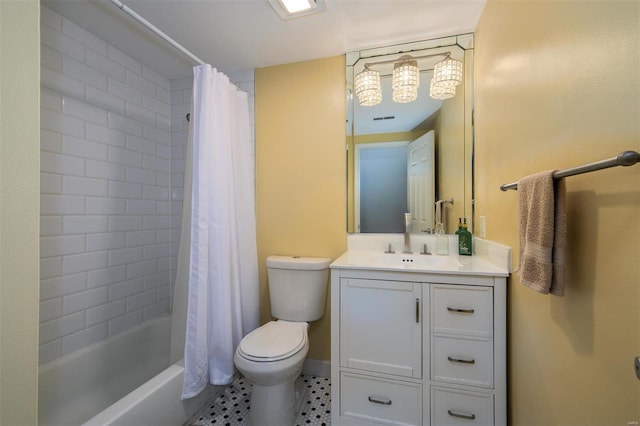 bathroom with vanity, baseboards, shower / bath combo, tile patterned floors, and toilet