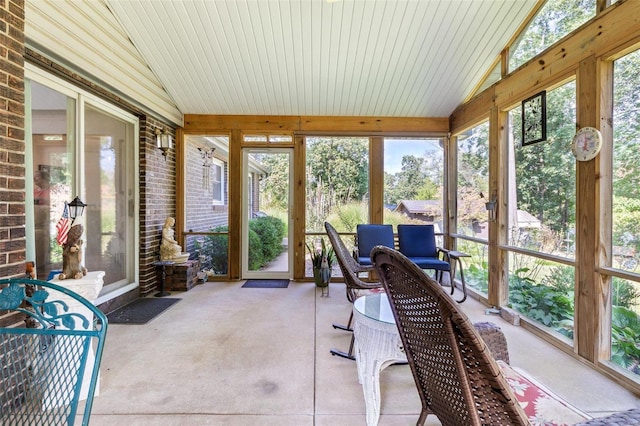 sunroom / solarium with lofted ceiling