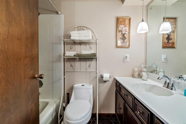 bathroom with vanity, shower / bathing tub combination, and toilet