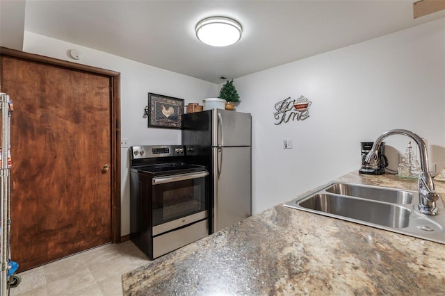 kitchen with stainless steel appliances and a sink