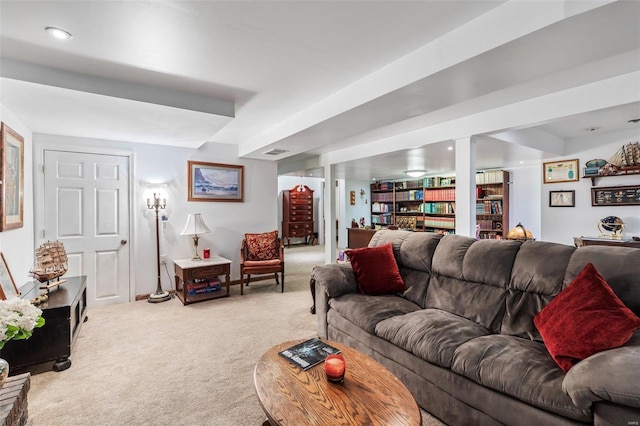 living area featuring visible vents, recessed lighting, and carpet floors