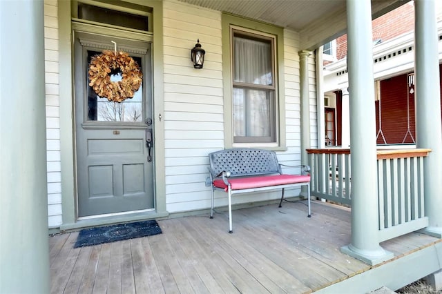 entrance to property with covered porch