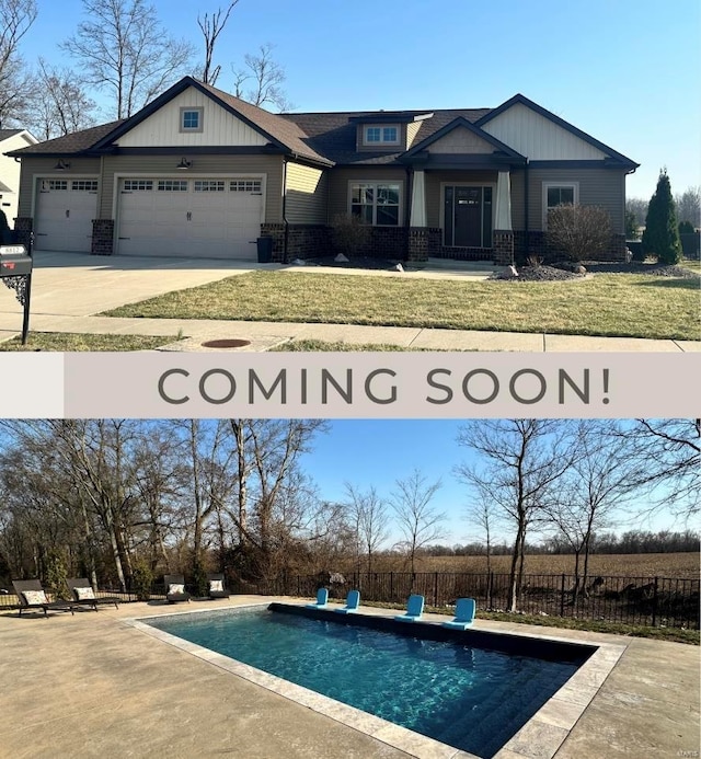 view of pool featuring a yard, fence, and a fenced in pool