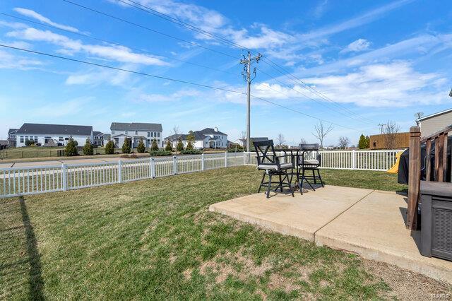 view of yard featuring a patio and a fenced backyard